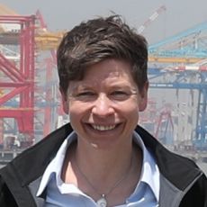 Luisa Kempf in front of a port terminal.