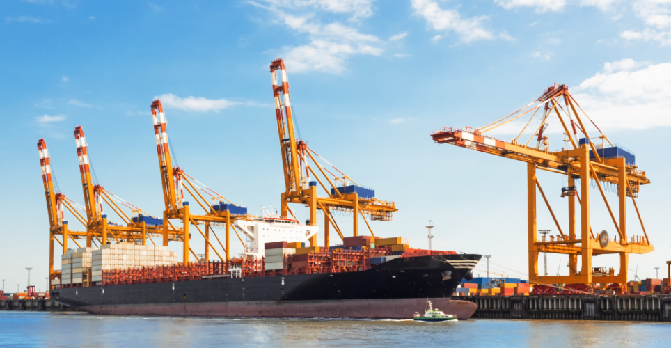 View of the container terminal from the water in bright good weather.