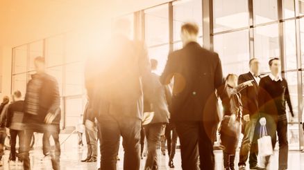 Visitors walk in a hall of the SDP conference.