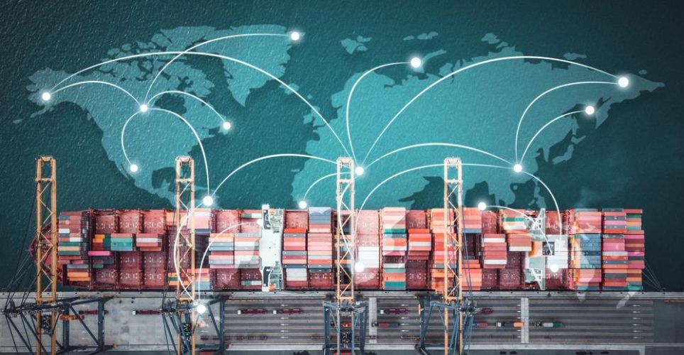 Aerial view of a container ship at a port, overlaid with a world map and digital network lines connecting global locations, symbolizing international logistics and terminal digitalization.