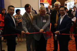 The organizers and representatives open the event and cut the red opening ribbon.